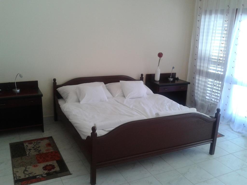 Napsugar Apartman Baja Zimmer foto
