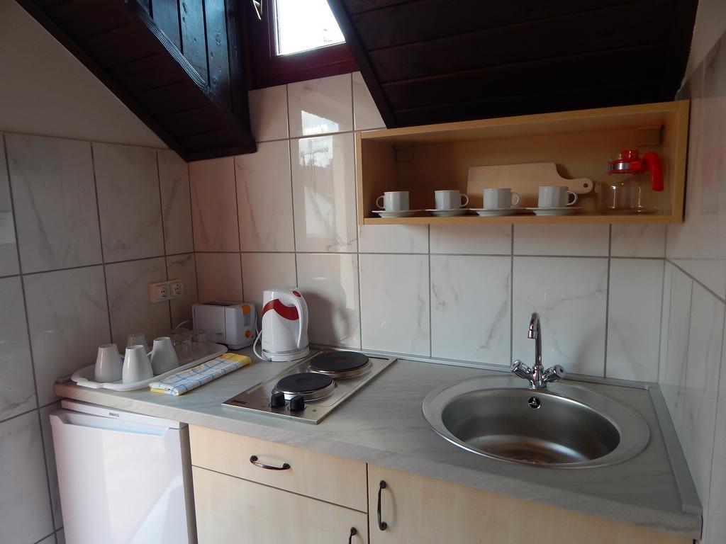 Napsugar Apartman Baja Zimmer foto